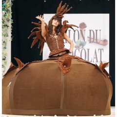 Model Irene Salvador wears dress constructed entirely of chocolate made by Chapon, for the 16th Salon du Chocolat in Paris