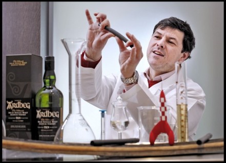 Dr Bill Lumsden, head of distilling at Ardbeg, prepares whisky vials to be taken into space. Courtesy of NASA. 